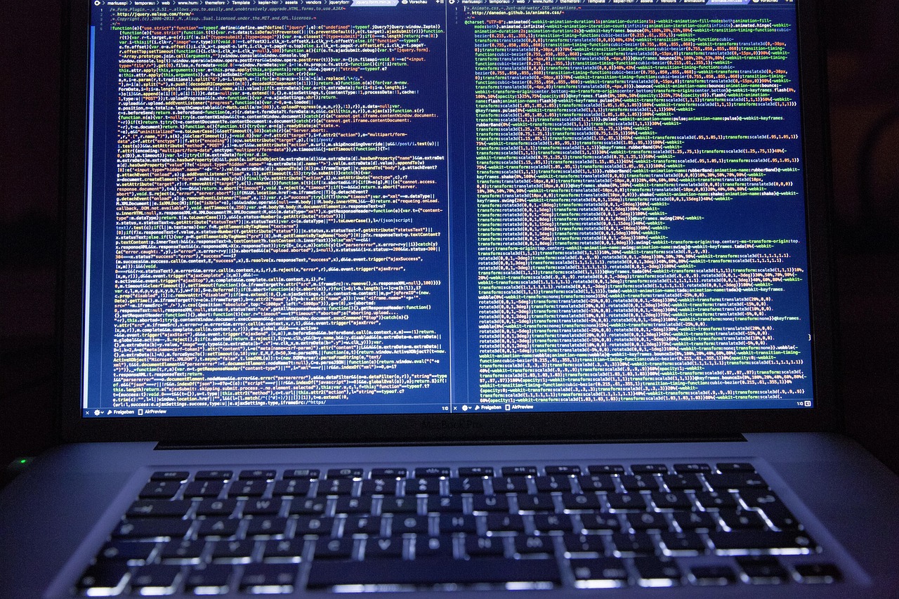 Website code displayed on a monitor
