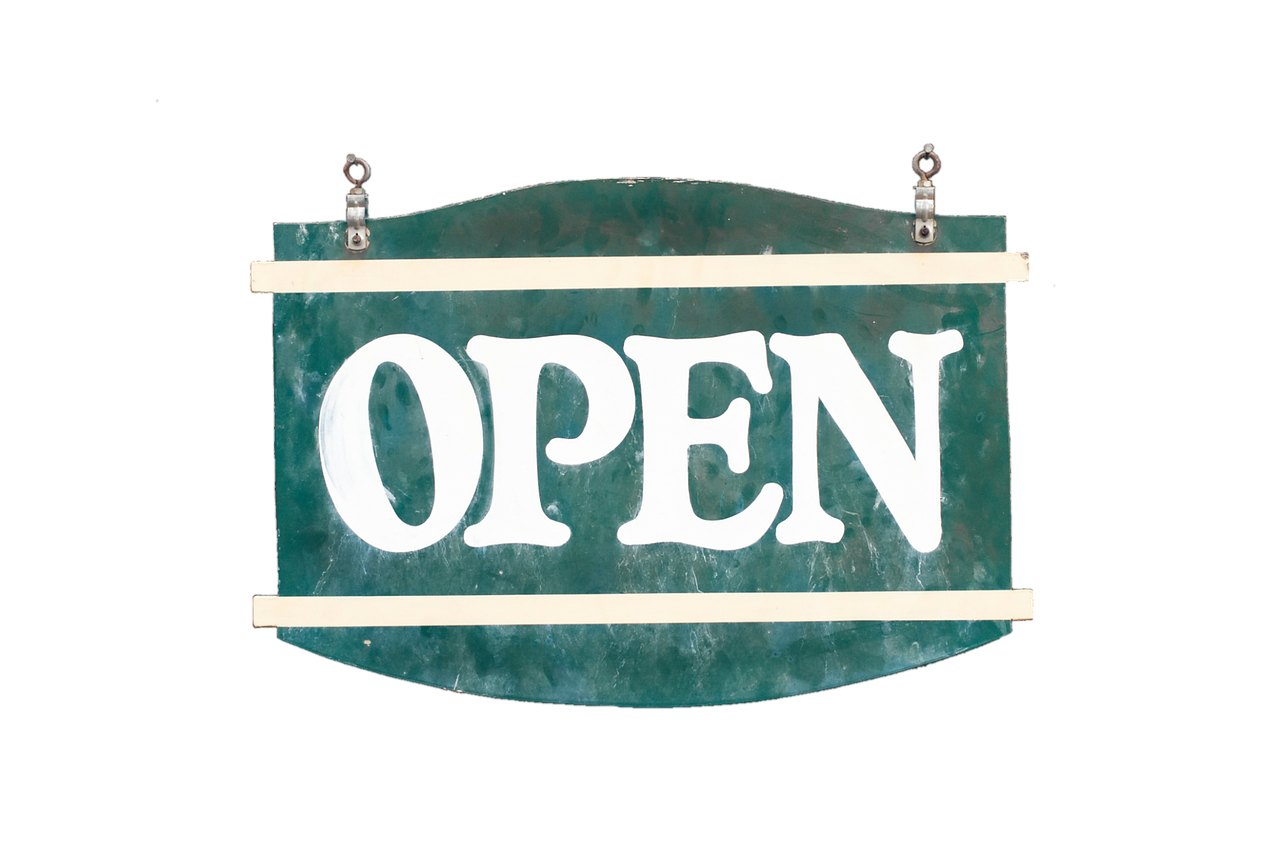 Open sign in a storefront door